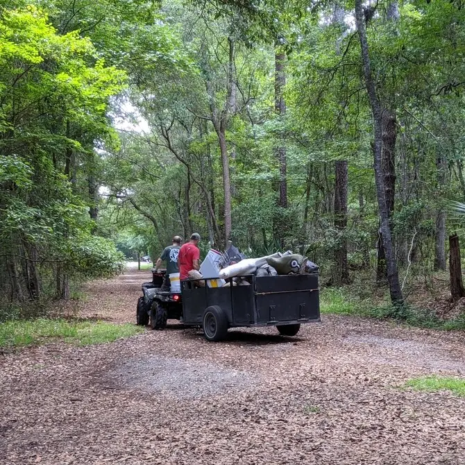 Off-road vehicle hauling supplies in woods